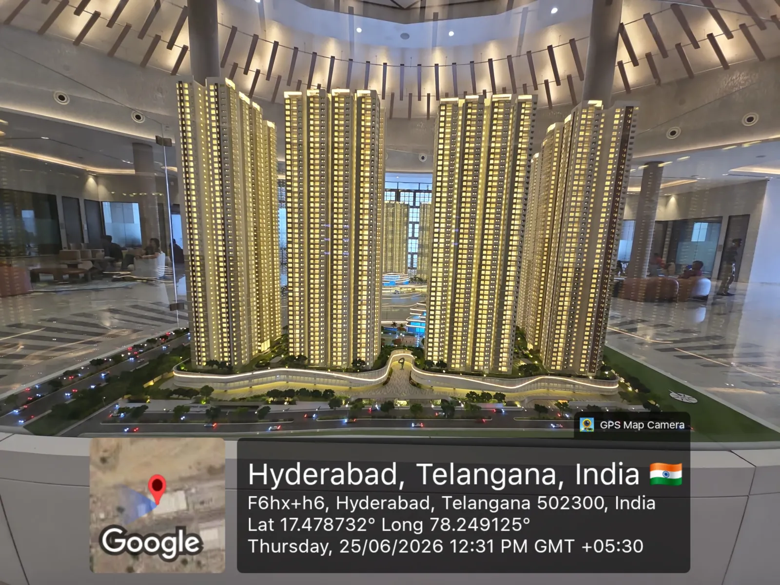 Prestige Golden Grove Scale Model — Tower Frontage & Roads (June 2026) Front view of the Prestige Golden Grove scale model showing the residential tower frontage, internal roads and landscaping, displayed at the on-site experience centre, Velimela, June 2026.